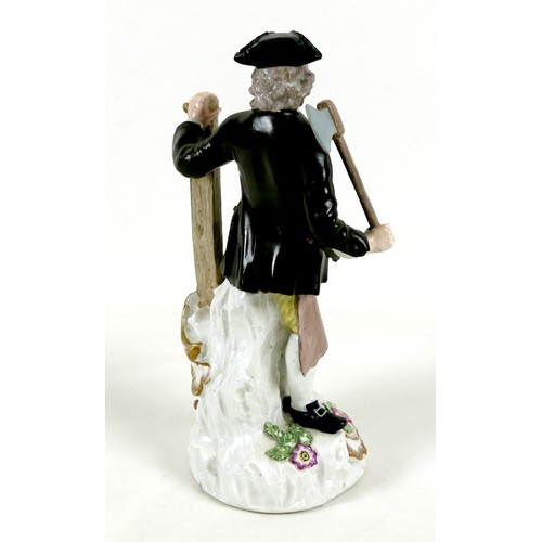 61 - A Meissen porcelain figure, mid 18th century, modelled as male carpenter, wearing a tricorn hat, bla... 