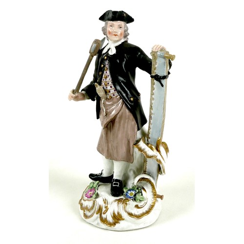 61 - A Meissen porcelain figure, mid 18th century, modelled as male carpenter, wearing a tricorn hat, bla... 