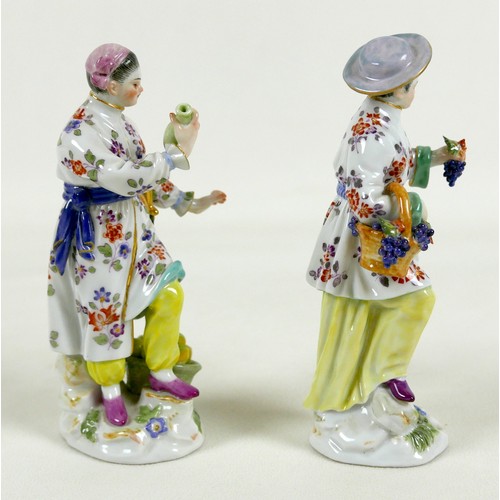 66 - A pair of Meissen porcelain figures, early 19th century, modelled as fruit sellers, model numbers 65... 