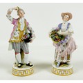 A pair of Meissen porcelain figures, mid 19th century, modelled as flower sellers, model numbers C72... 