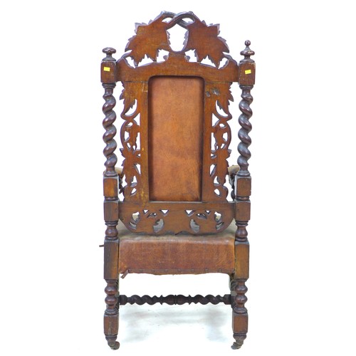 230 - An oak 19th century armchair, with pierced carved foliate designed back, barley twist supports, carv... 