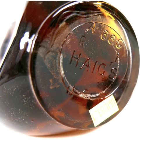 104 - A bottle of Haig's 'Dimple' old blended Scotch whisky, circa 1940, label inscribed 'By Appointment T... 