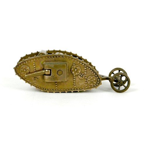 116 - A WWI trench art brass Mk 1 tank, with two side guns, and rear steering wheels, 13 by 4.8 by 4.2cm h... 