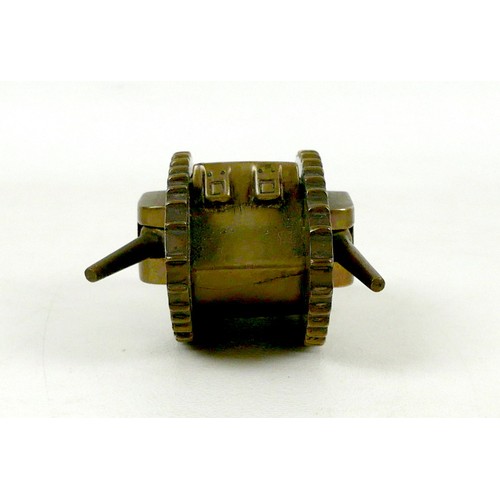 116 - A WWI trench art brass Mk 1 tank, with two side guns, and rear steering wheels, 13 by 4.8 by 4.2cm h... 