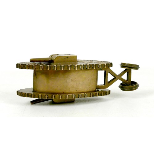 116 - A WWI trench art brass Mk 1 tank, with two side guns, and rear steering wheels, 13 by 4.8 by 4.2cm h... 