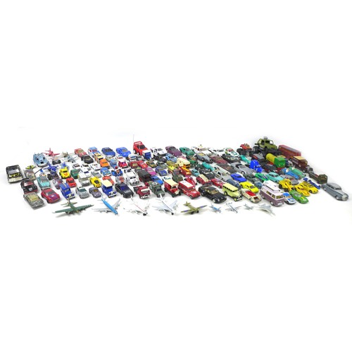 106A - A large collection of playworn Dinky and Corgi toy cars, together with a group of plastic and metal ... 