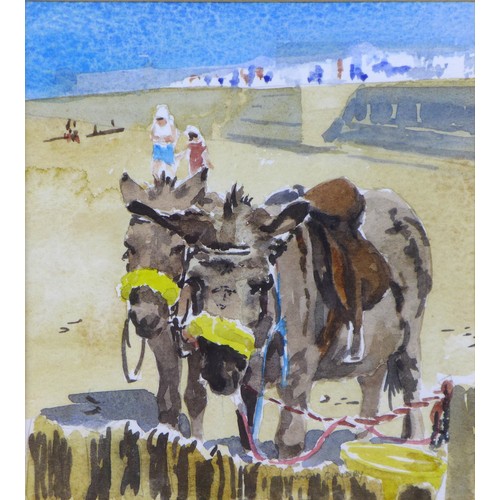 63 - Mary Gundry (British, b. 1951): two seaside donkeys waiting on the beach, signed below slightly righ... 