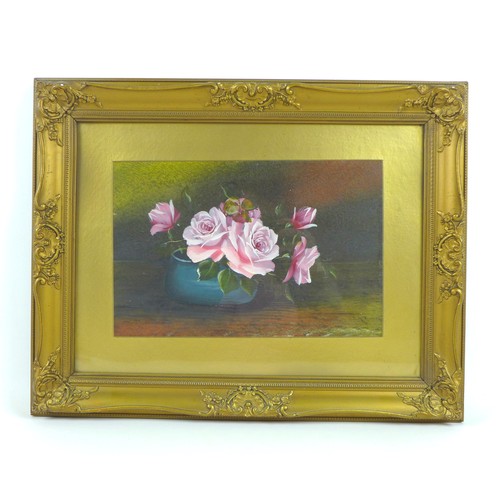 101 - Two 20th century still life paintings, depicting floral displays, unsigned, in gilt frames, 19 by 29... 