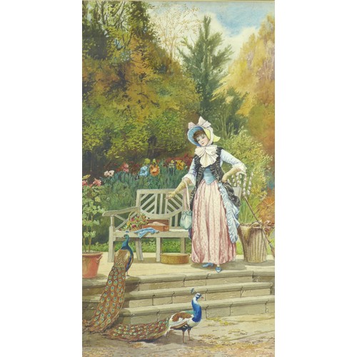 67 - J. Lowe (British School, early 20th century): depicting a woman stood in a garden feeding two peacoc... 