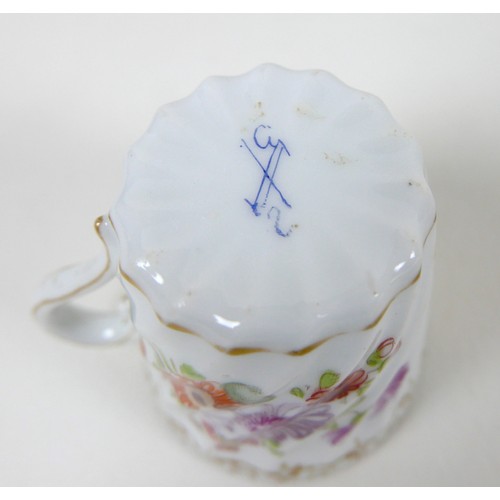 40 - A Dresden porcelain demi-tasse cup, 19th century, 5.7 by 6cm, spiral fluted and decorated with flowe... 