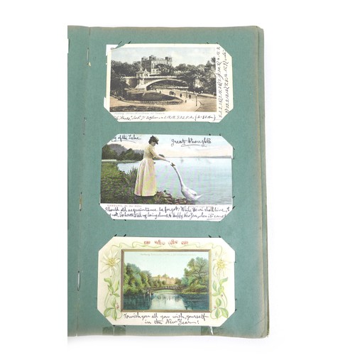 65 - An Edwardian photograph album, together with five sets of cigarette cards. (1 bag)