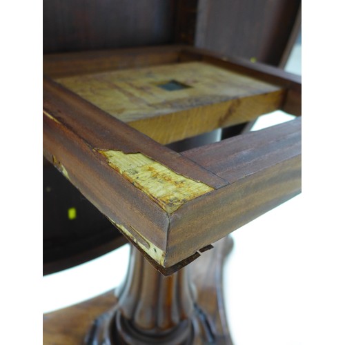 233 - A 19th century mahogany circular top breakfast table, with tilt top mechanism, with fluted column tr... 