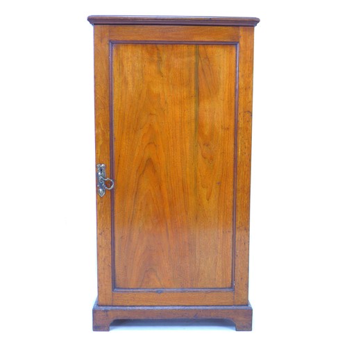 229 - A Victorian mahogany silver cupboard, with three shelves enclosed by a single door, 57.5 by 39 by 11... 