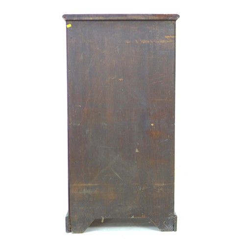 229 - A Victorian mahogany silver cupboard, with three shelves enclosed by a single door, 57.5 by 39 by 11... 