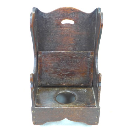 236 - An early 18th century oak child’s potty chair, with wing back and lift seat, 37.5 by 42 by 60cm high... 