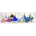 A group of eleven Royal Doulton, Coalport and Franklin Porcelain figurines, all modelled as ladies, ... 