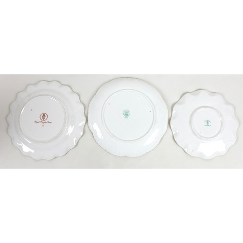 12 - A group of mixed ceramics, including a Wedgwood charger, pattern W 1959, 39.4 by 39.4cm, eight piece... 
