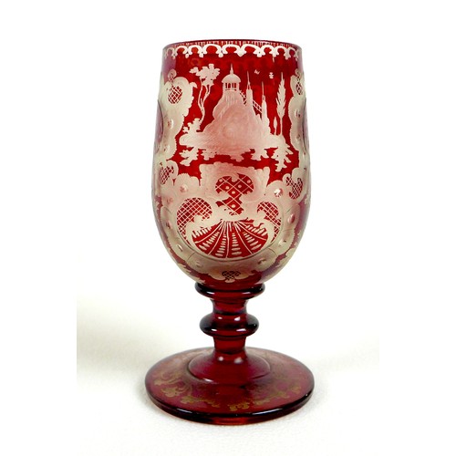 13 - A group of glassware, comprising a 19th century cranberry flashed glass liqueur glass, finely wheel ... 