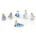 A group of six Lladro figurines, comprising 'All aboard', 7619), 13cm high, 'School Days', 7604, 20.... 