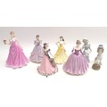 A group of modern china figurines, comprising five Coalport and one Leonardo Collection figurines, a... 