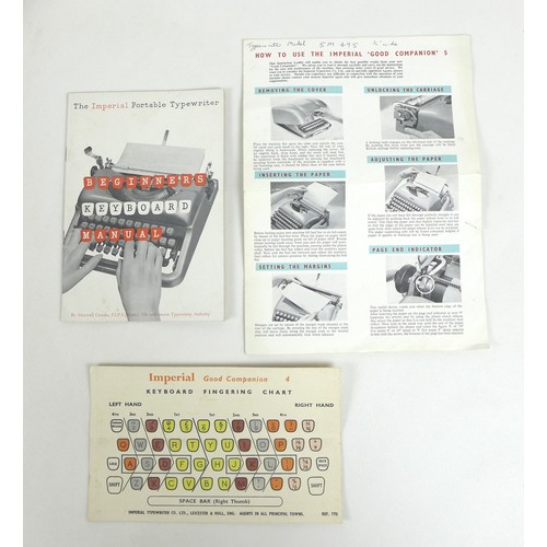 53 - A 20th century Imperial 'Good Companion 5' portable typewriter, in pale green, with two keys, origin... 