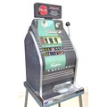 A vintage Sega Monaco one-armed-bandit, slot machine, with stand and assorted tokens, without key an... 