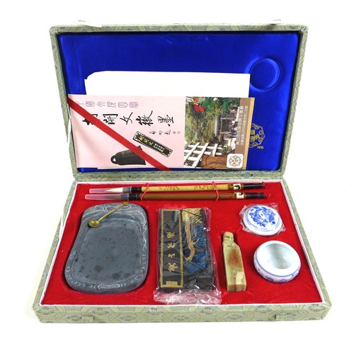 66 - A collection of 20th century Chinese collectables, including a cased Mahjong game, a boxed group of ... 