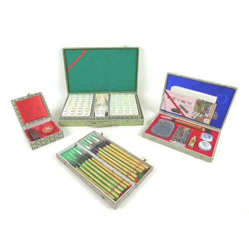 66 - A collection of 20th century Chinese collectables, including a cased Mahjong game, a boxed group of ... 