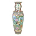 A gargantuan 20th century Oriental style vase, of baluster form with gilt lug handles, its reserves ... 