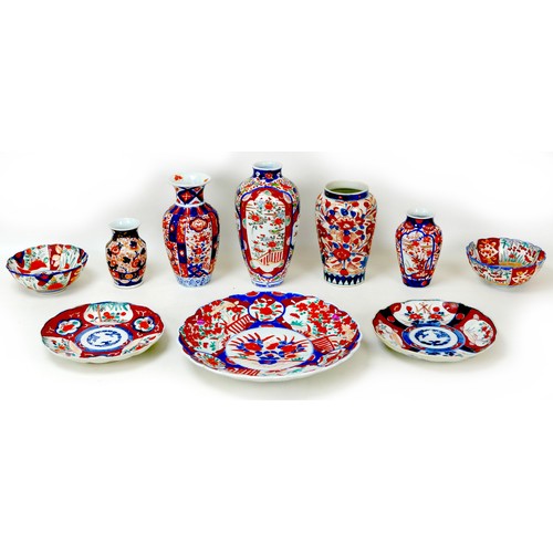 6 - A collection of Japanese porcelain, Meiji period and later, all decorated in the imari pattern, comp... 