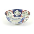 An early 20th century Japanese porcelain Imari bowl, 21 by 9cm high.