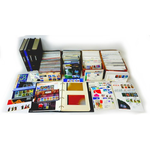 A collection of British mint presentation packs and other stamps, comprising over 300 mint presentation packs, an album with mint stamp booklets first class stamps, with over eighty 1st class stamps, three other albums of used British stamps, together with a large collection FDCs. (3 boxes)