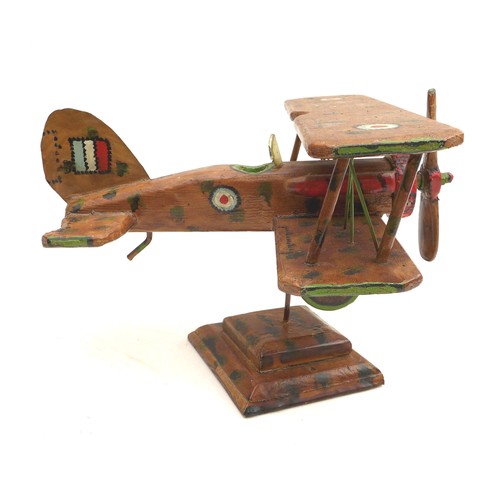 68 - A vintage wooden scratch built WWI biplane, possibly a Sopwith Camel, decorated with hand painted RA... 