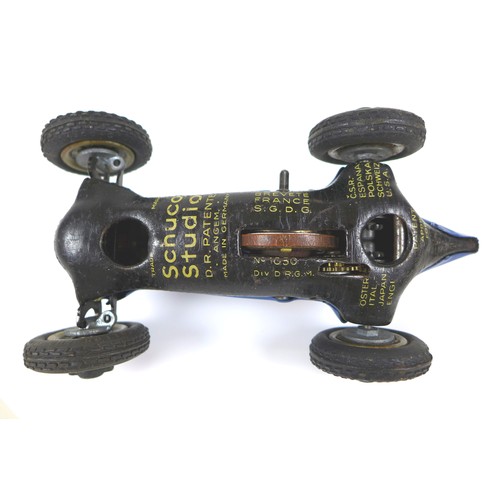 70 - A Schuco Studio tinplate clockwork model racing car, 'The Steerable Driving-School Car', blue, 'No 8... 