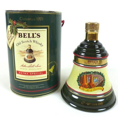 76 - A group of commemorative Bell's Whisky decanters, comprising a Christmas 1991 decanter, 70cl, 40% vo... 