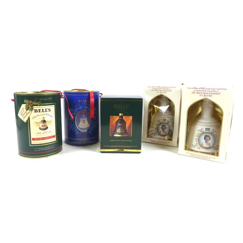 76 - A group of commemorative Bell's Whisky decanters, comprising a Christmas 1991 decanter, 70cl, 40% vo... 