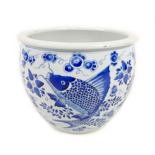 2 - A Chinese porcelain blue and white fish bowl, decorated with fish and foliate detail, 22.5 by 18cm h... 