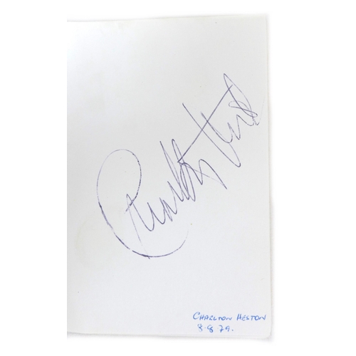 116 - Autographs of Charlton Heston, dated '3.8.79' whilst Heston was filming 