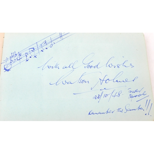 117 - A circa WWII autograph book featuring Glen Miller's signature, as well as other acts that featured a... 