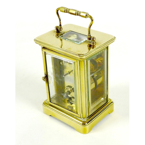 138 - A brass carriage clock by Matthew Norman, circa 1980s, the white dial with black Roman numerals and ... 