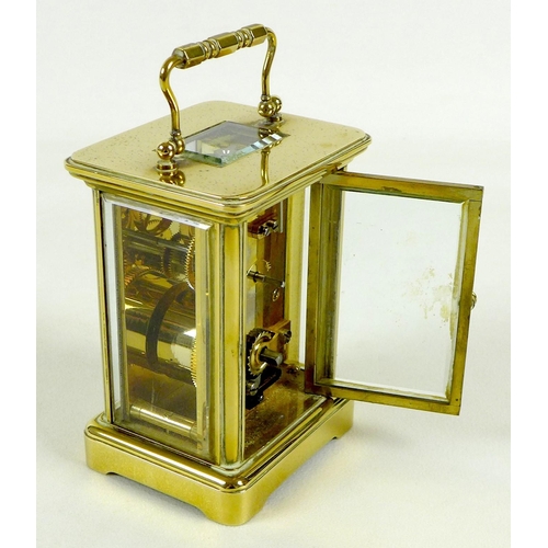 138 - A brass carriage clock by Matthew Norman, circa 1980s, the white dial with black Roman numerals and ... 