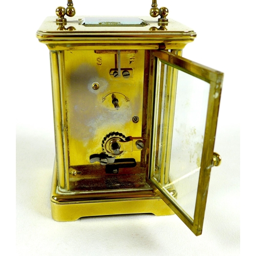 138 - A brass carriage clock by Matthew Norman, circa 1980s, the white dial with black Roman numerals and ... 