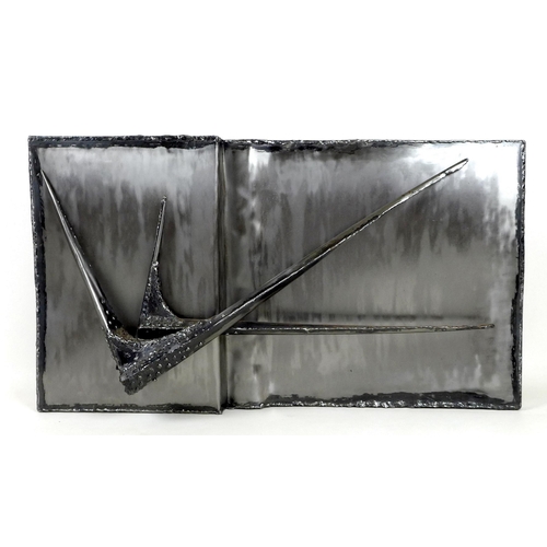 149 - Noel Black (British, late 20th century): a welded steel abstract wall sculpture, with star form deta... 