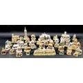 A large group of Lilliput Lane ornamental sculptures, including battery operated light up 'Lead Kind... 