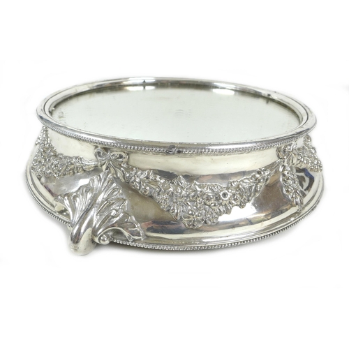 156 - A mid 20th century silver plated wedding cake stand, of circular form, with mirrored centre surround... 