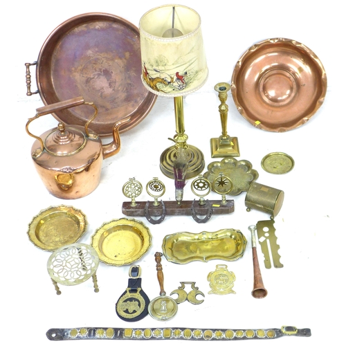 158 - A group of copper and brass items, including horse brasses, jam pan, kettle, decorative charger, tri... 