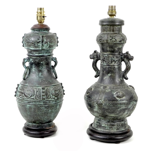 163 - Two 20th century Oriental style bronzed metal table lamps, both of baluster form raised upon wooden ... 