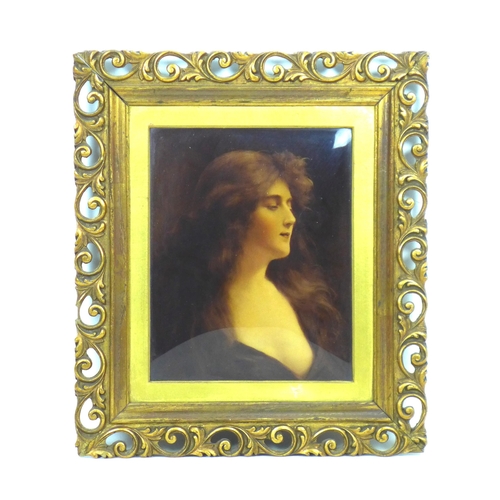 168 - An early 20th century Christoleum portrait of a young lady, 25 by 20cm, in a pierced gilt frame, 39.... 