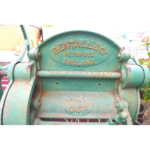 201 - A 20th century Bentall & Co cattle feed grain grinder, previously used as a garden feature, 70 by 87... 