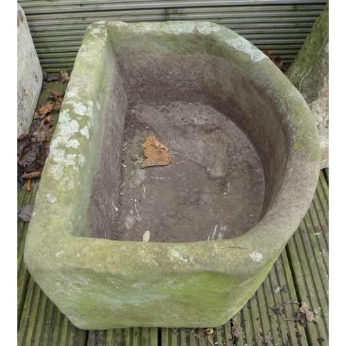 202 - An early 20th century stone trough originally from a Tetbury piggery, 63 by 46 by 27cm high.